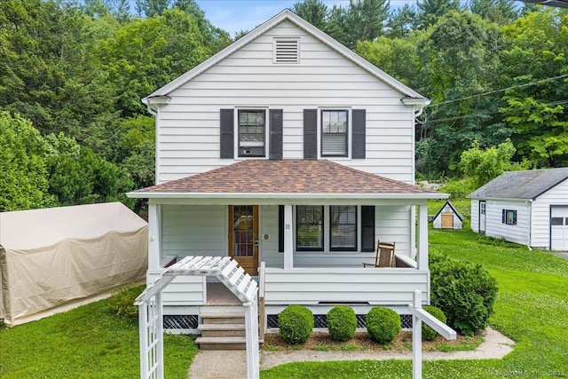 10 Gifford Ln, Norwich, CT 06389 - american foursquare style home with a porch, a front yard, and a shingled roof