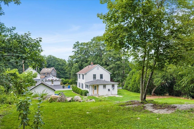 10 Gifford Ln, Norwich, CT 06389 - view of front facade with a front lawn and a chimney