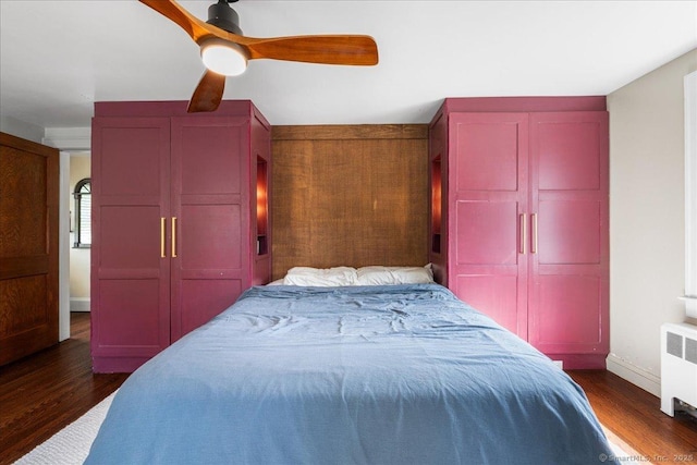 10 Gifford Ln, Norwich, CT 06389 - bedroom featuring radiator heating unit, dark wood finished floors, and ceiling fan