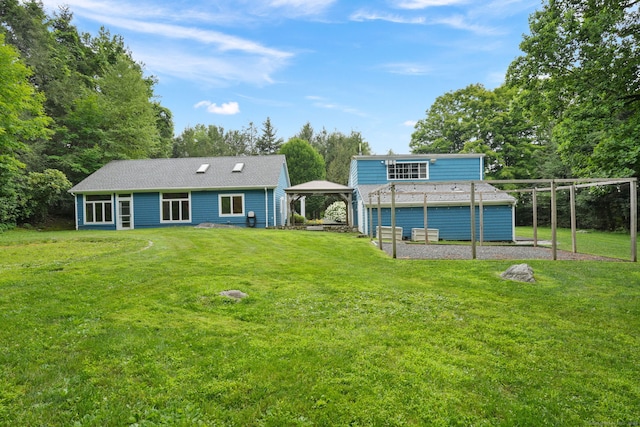 224 Fan Hill Rd, Monroe, CT 06468 - rear view of house with a gazebo, a yard, and a detached carport