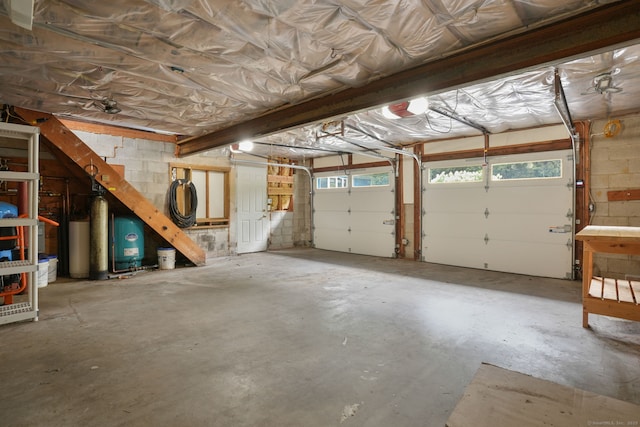 224 Fan Hill Rd, Monroe, CT 06468 - garage with a garage door opener and concrete block wall