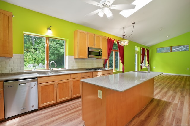 224 Fan Hill Rd, Monroe, CT 06468 - kitchen featuring stainless steel appliances, light wood-style flooring, tasteful backsplash, a skylight, and lofted ceiling