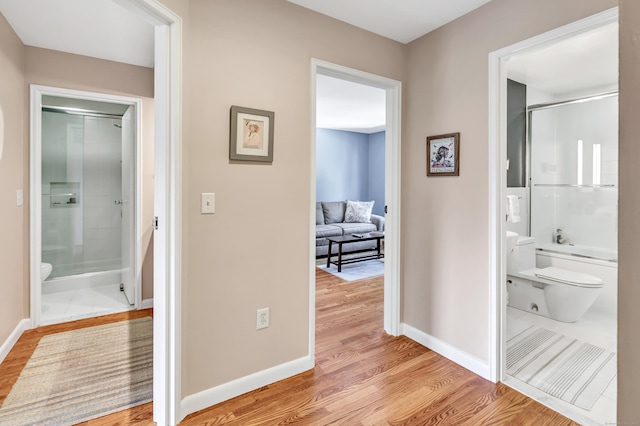 6 Hills Ln Unit 6, Norwalk, CT 06880 - corridor featuring light wood finished floors and baseboards
