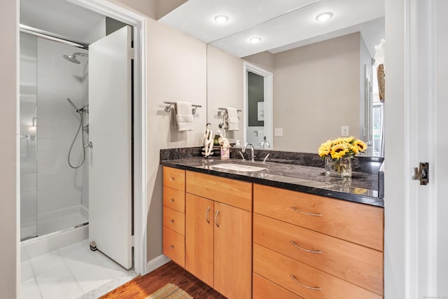 6 Hills Ln Unit 6, Norwalk, CT 06880 - full bathroom featuring a walk in shower, vanity, and recessed lighting