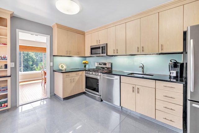 6 Hills Ln Unit 6, Norwalk, CT 06880 - kitchen with stainless steel appliances, light brown cabinetry, and dark countertops