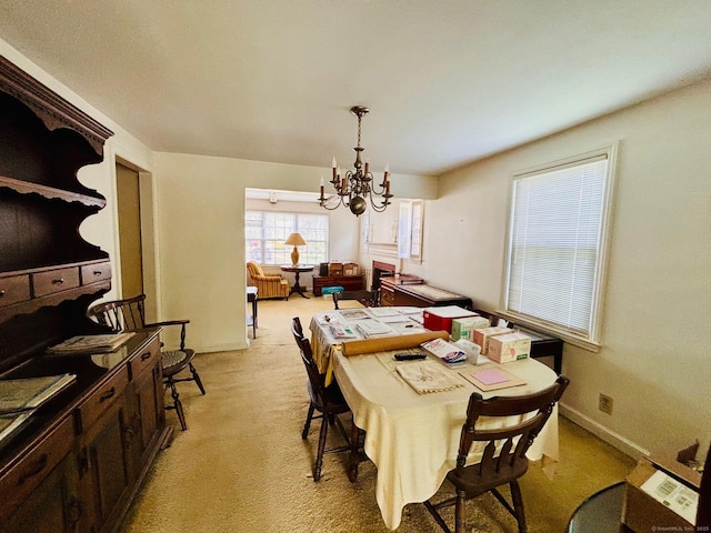 84 Blamey Cir, Stratford, CT 06614 - dining area featuring a chandelier and light colored carpet