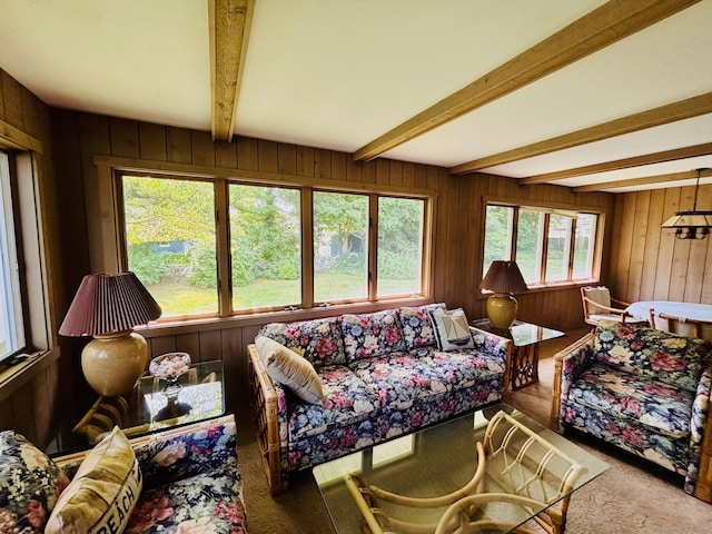 84 Blamey Cir, Stratford, CT 06614 - carpeted living area with beam ceiling and wood walls
