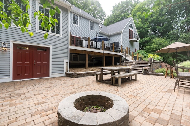 80 Jeremiahs Way, Glastonbury, CT 06073 - view of patio / terrace with stairs, an outdoor fire pit, a deck, and outdoor dining space