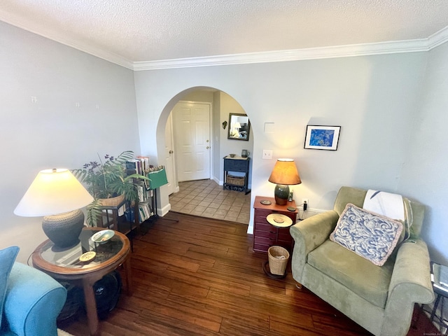 500 Prospect St Apt 4A, New Haven, CT 06511 - living area with arched walkways, wood-type flooring, crown molding, and a textured ceiling