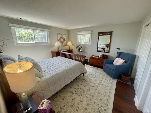 500 Prospect St Apt 4A, New Haven, CT 06511 - bedroom with wood finished floors and a textured ceiling