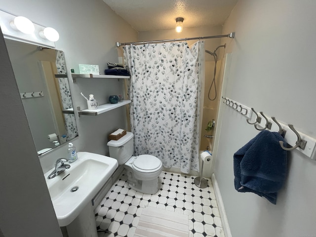 500 Prospect St Apt 4A, New Haven, CT 06511 - bathroom with shower / bath combo, a textured ceiling, and tile patterned flooring