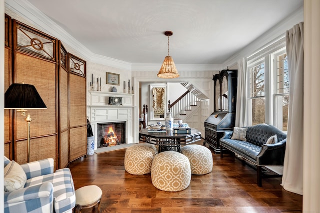 75 Green Hill Rd, Washington, CT 06793 - living room featuring stairway, dark wood-type flooring, a large fireplace, and ornamental molding