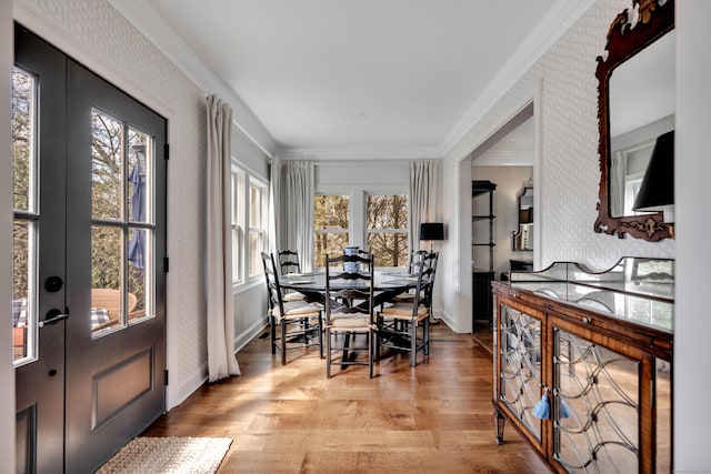 75 Green Hill Rd, Washington, CT 06793 - dining space with wallpapered walls, crown molding, and wood finished floors