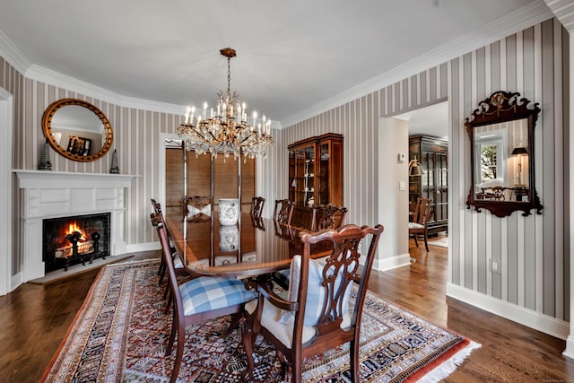 75 Green Hill Rd, Washington, CT 06793 - dining area with crown molding, wallpapered walls, a chandelier, wood finished floors, and a warm lit fireplace