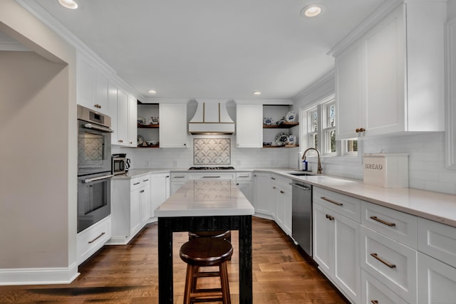 75 Green Hill Rd, Washington, CT 06793 - kitchen with open shelves, premium range hood, appliances with stainless steel finishes, white cabinets, and recessed lighting