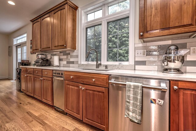 8 Dogwood Ct, Woodbridge, CT 06525 - kitchen featuring dishwasher, light wood finished floors, light countertops, decorative backsplash, and recessed lighting