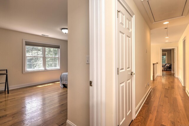 8 Dogwood Ct, Woodbridge, CT 06525 - hall featuring attic access, wood finished floors, and recessed lighting