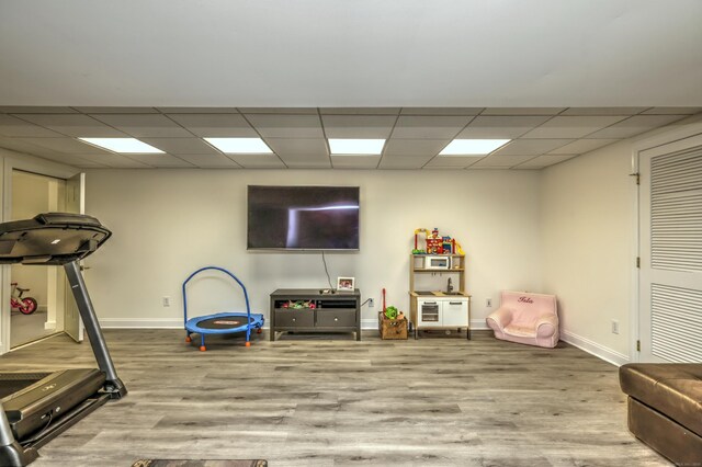 8 Dogwood Ct, Woodbridge, CT 06525 - workout room with a drop ceiling and wood finished floors