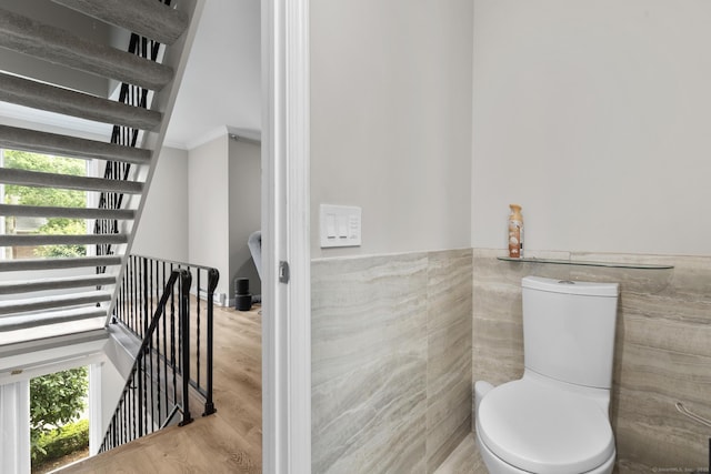 3 Radio Pl Unit 3, Stamford, CT 06906 - bathroom with tile walls, ornamental molding, wood finished floors, and a wainscoted wall