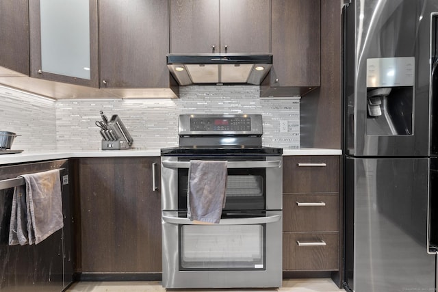 3 Radio Pl Unit 3, Stamford, CT 06906 - kitchen featuring stainless steel appliances, exhaust hood, dark brown cabinetry, and light countertops
