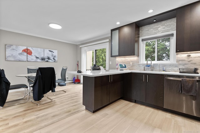 3 Radio Pl Unit 3, Stamford, CT 06906 - kitchen featuring dishwasher, a peninsula, light countertops, dark brown cabinets, and recessed lighting