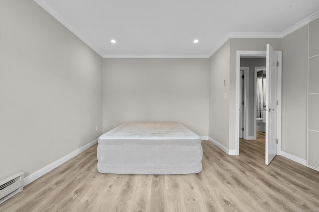 3 Radio Pl Unit 3, Stamford, CT 06906 - unfurnished bedroom featuring a baseboard radiator, light wood finished floors, ornamental molding, and recessed lighting