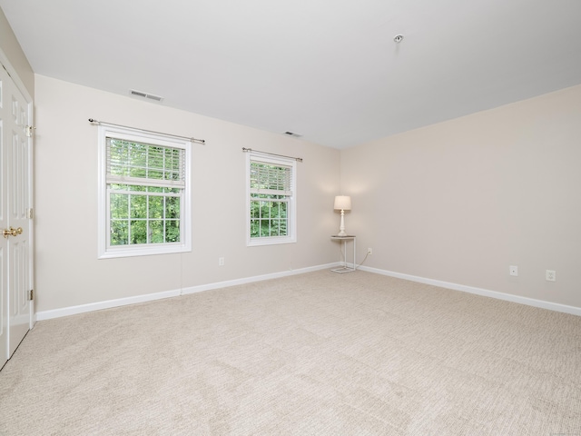 570 Danbury Rd Unit 14, Ridgefield, CT 06877 - spare room featuring baseboards and light colored carpet