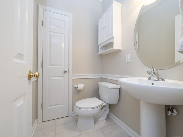 570 Danbury Rd Unit 14, Ridgefield, CT 06877 - half bath featuring toilet and tile patterned floors