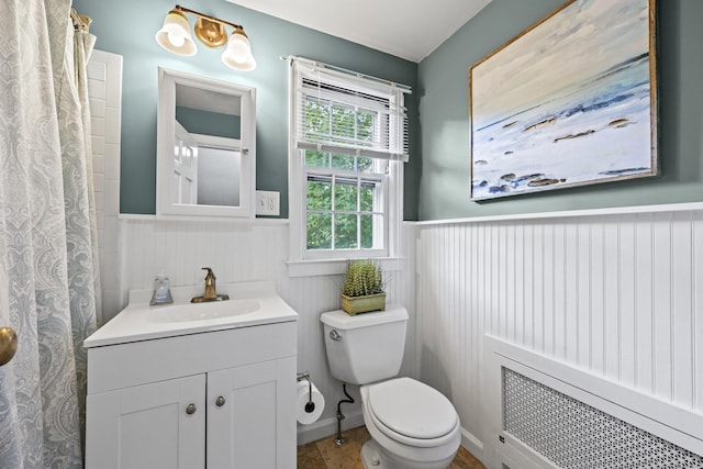 29 Boswell Rd, West Hartford, CT 06107 - full bathroom with radiator, wainscoting, vanity, and a shower with shower curtain