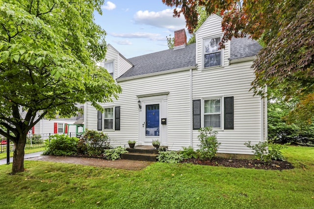 29 Boswell Rd, West Hartford, CT 06107 - view of front facade featuring a shingled roof and a chimney