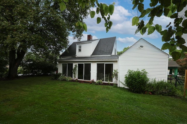 29 Boswell Rd, West Hartford, CT 06107 - back of house with a chimney and roof with shingles