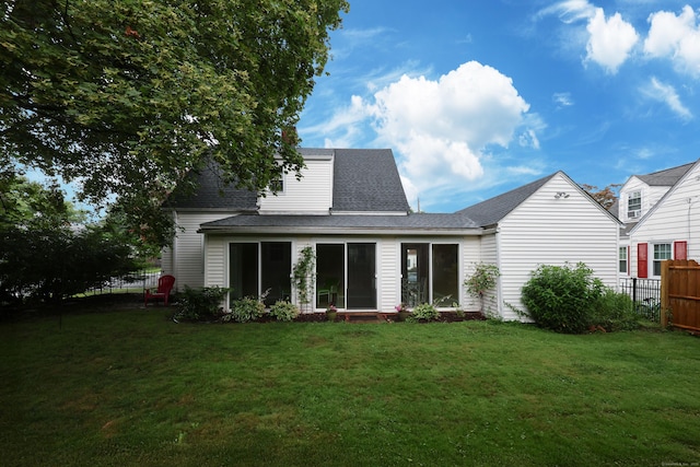 29 Boswell Rd, West Hartford, CT 06107 - back of property with a sunroom