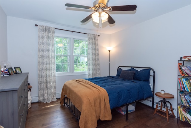 34 Taft St, Killingly, CT 06239 - bedroom featuring wood finished floors, a ceiling fan, and a baseboard radiator