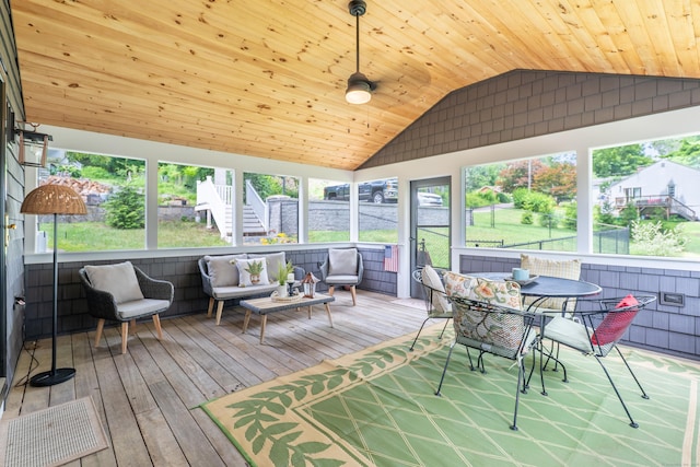 56 Wildwood Rd, East Haddam, CT 06423 - sunroom featuring lofted ceiling, an outdoor hangout area, and outdoor dining space