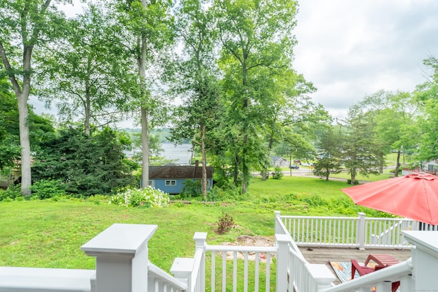 56 Wildwood Rd, East Haddam, CT 06423 - view of green lawn featuring a deck