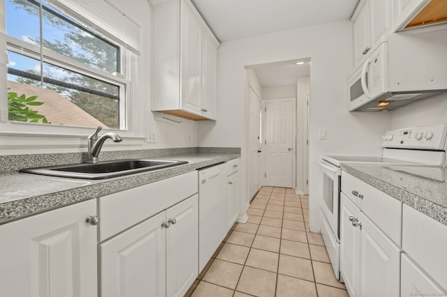 11 Danforth Ln Unit 11, Rocky Hill, CT 06067 - kitchen with white appliances, white cabinets, light tile patterned flooring, and light countertops