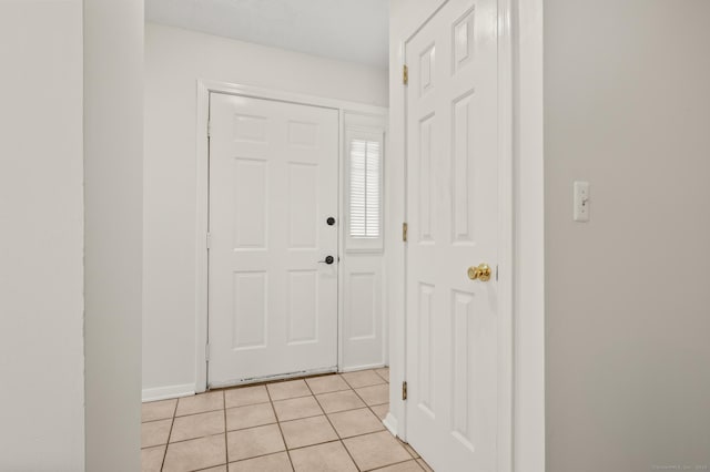 11 Danforth Ln Unit 11, Rocky Hill, CT 06067 - entrance foyer featuring light tile patterned flooring and baseboards