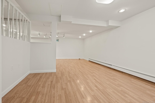 11 Danforth Ln Unit 11, Rocky Hill, CT 06067 - spare room featuring baseboard heating, light wood finished floors, and recessed lighting