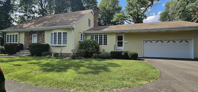 187 Two Rod Hwy, Wethersfield, CT 06109 - view of front of house featuring asphalt driveway, a chimney, a front yard, a garage, and roof with shingles
