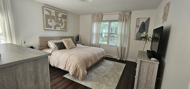 187 Two Rod Hwy, Wethersfield, CT 06109 - bedroom featuring dark wood-style floors and a baseboard radiator