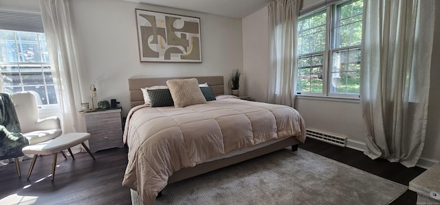 187 Two Rod Hwy, Wethersfield, CT 06109 - bedroom with dark wood-style floors and baseboard heating