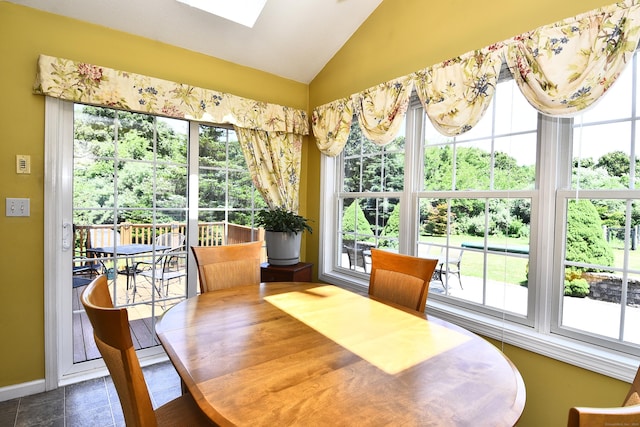 32 Sable Dr, Ledyard, CT 06339 - dining space with healthy amount of natural light, a skylight, and vaulted ceiling