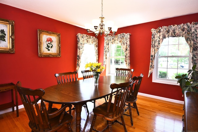 32 Sable Dr, Ledyard, CT 06339 - dining area featuring healthy amount of natural light, a chandelier, and light wood-style floors