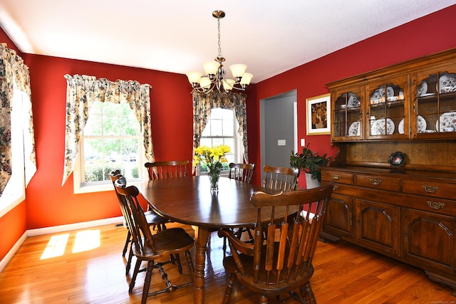 32 Sable Dr, Ledyard, CT 06339 - dining space featuring a chandelier and light wood-style floors