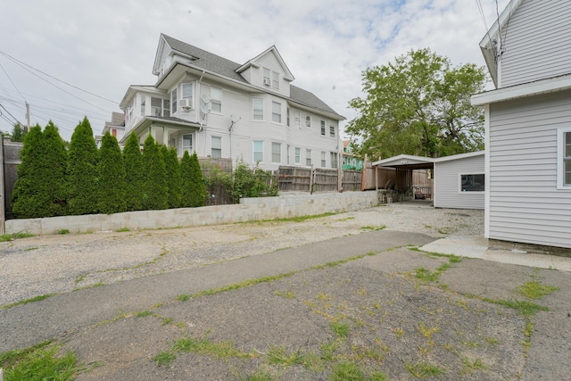 72 Harral Ave, Bridgeport, CT 06604 - view of side of home with roof with shingles