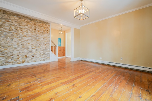 72 Harral Ave, Bridgeport, CT 06604 - empty room featuring a baseboard radiator, a chandelier, wood-type flooring, stairs, and crown molding