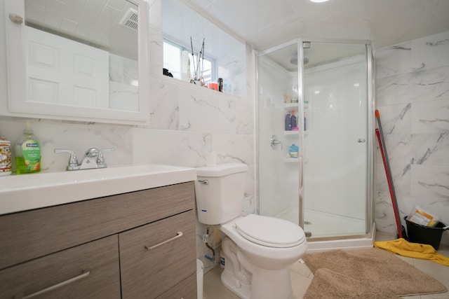 72 Harral Ave, Bridgeport, CT 06604 - bathroom with tile walls, vanity, and a stall shower