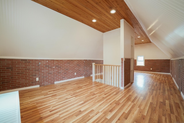 72 Harral Ave, Bridgeport, CT 06604 - bonus room with brick wall, wood finished floors, wainscoting, vaulted ceiling, and recessed lighting