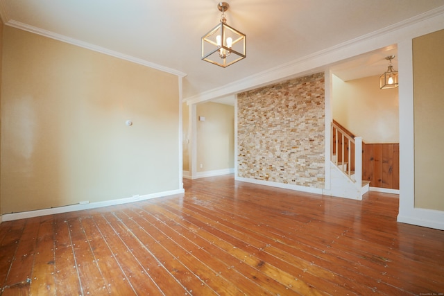 72 Harral Ave, Bridgeport, CT 06604 - empty room featuring stairway, a chandelier, crown molding, and wood-type flooring