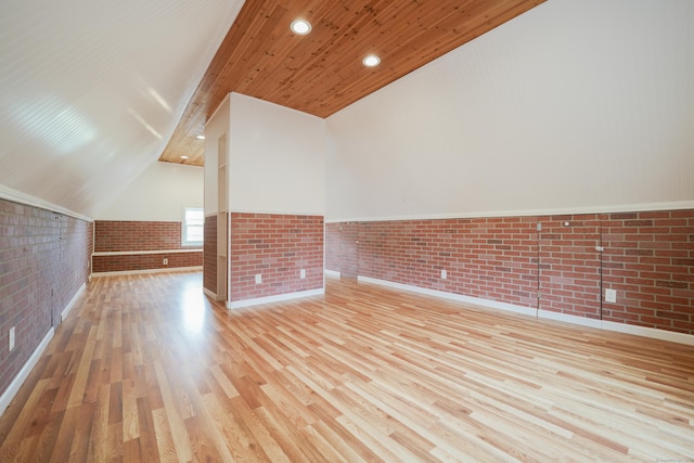 72 Harral Ave, Bridgeport, CT 06604 - additional living space featuring brick wall, wooden ceiling, wood finished floors, a wainscoted wall, and lofted ceiling
